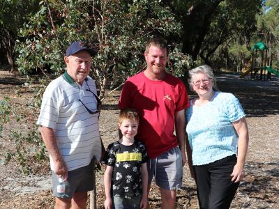 Fred, Jackson, Phil and Margaret Sharp with the tree they purchased in the  Community Forest at John Okey Davis Park, in Gosnells. The Sharp family purchased the  tree, which they named Groot, because they wanted to support more trees being planted  in the neighbourhood