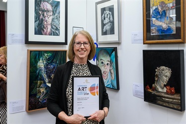 Winning artist with their artwork