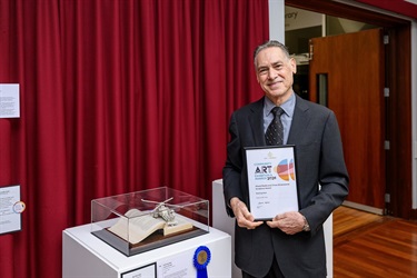 Winning artist with their artwork