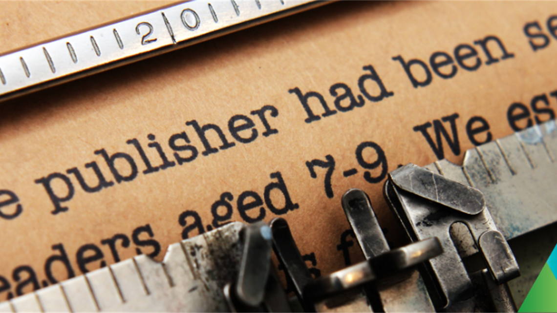 Black text on brown paper, in a typewriter