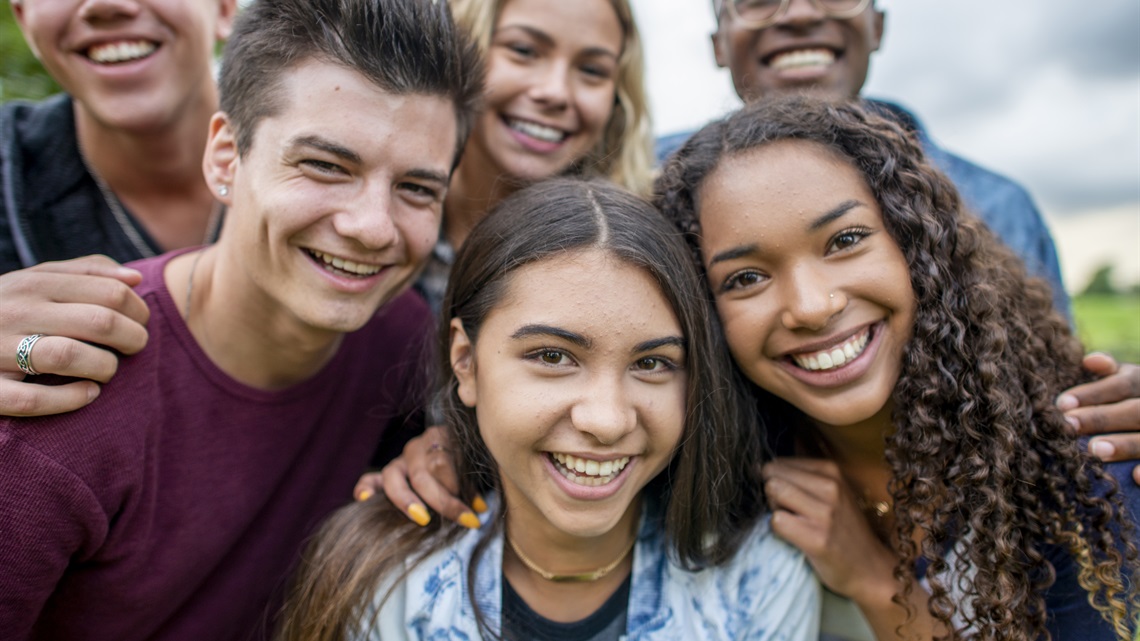 Group of teenagers as friends selfie happy.jpg