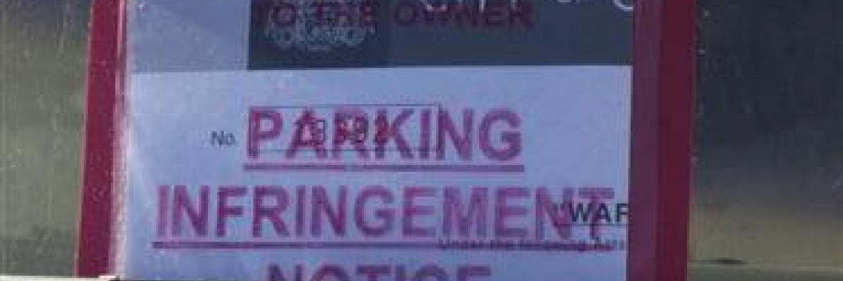 Parking Infrigement Notice on car window