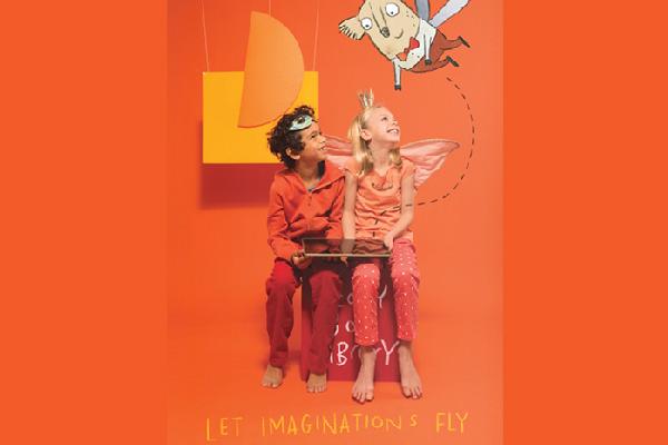 Let imaginations fly Storybox promotion with two children and cartoon character
