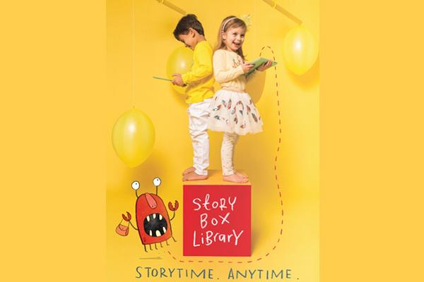 Storytime anytime Storybox promotion with two children and cartoon character