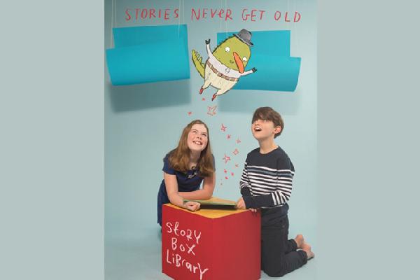 Stories never get old Storybox promotion with two children and cartoon character