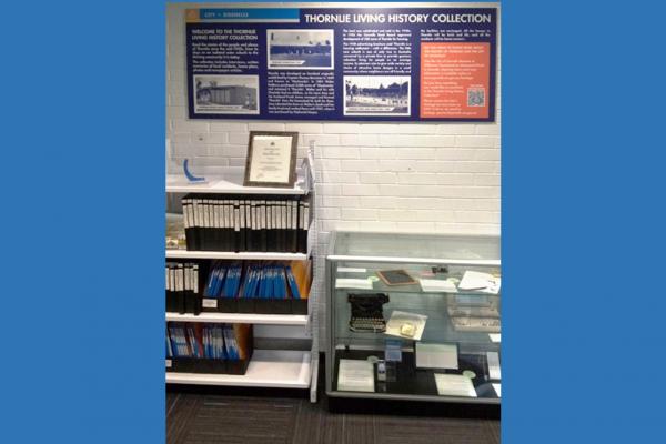 Small collection of historic documents and items on display