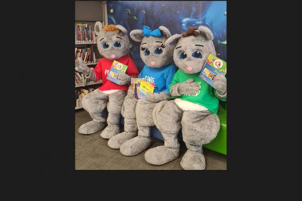Three possum suits in the library
