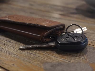 Car keys on wooden table