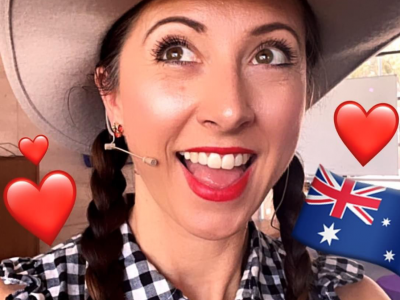 A woman in an akubra har and country-style shirt.