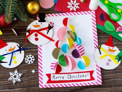 Handmade Christmas card and festive craft decorations