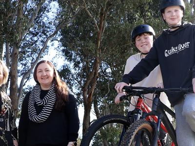 Mayor Terresa Lynes and Councillor Serena Williamson with Laith Powell and Cam Sutherland at Nolan Avenue Reserve where the boys are building a dirt pump track.