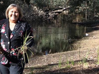 City of Gosnells Mayor Terresa Lynes with some of the recently-planted seedlings at Homestead Park in Thornlie.