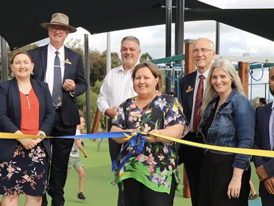 City of Gosnells Mayor Terresa Lynes cuts the ribbon to officially open the Sutherlands Park all-abilities playground