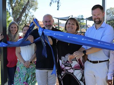 City of Gosnells Councillors, (left to right) Cr Ken Ashwin, Cr Dianne Lloyd, Cr Serena Williamson, Kevin McDonald, Mayor Terresa Lynes, Deputy Mayor Adam Hort, Cr Saiful Islam, Cr David Goode and Cr Emma Zhang, officially declare the Bracadale Dog Park, in Canning Vale, open.