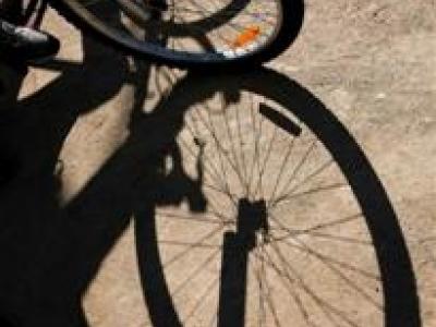 Bicycle wheel and shadow
