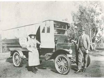 Miss Grace Michel, Mr Baumberger and his bus circa 1924